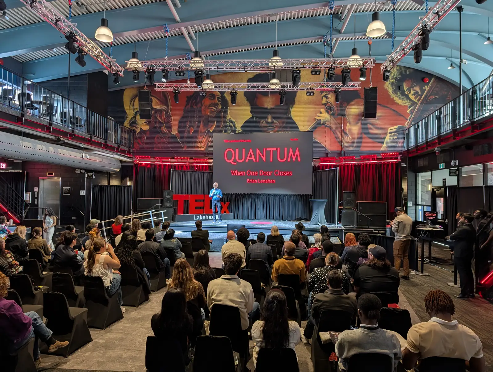 A packed audience watching Brian Lenahan's quantum talk
